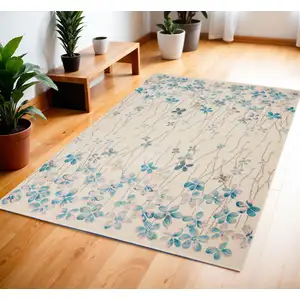 Photo of Ivory And Blue Floral Area Rug