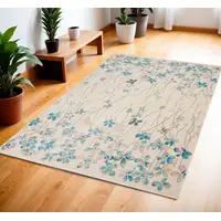 Photo of Ivory And Blue Floral Area Rug