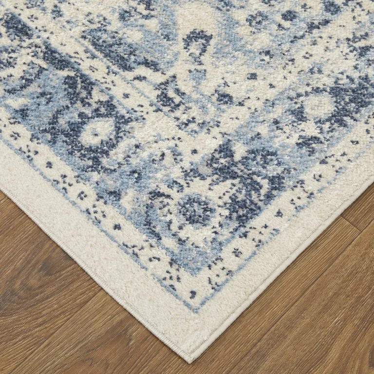 Ivory And Blue Floral Power Loom Distressed Area Rug Photo 4