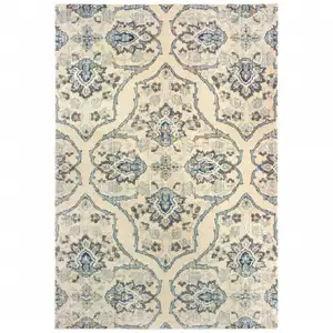 Photo of Ivory And Blue Floral Power Loom Stain Resistant Area Rug