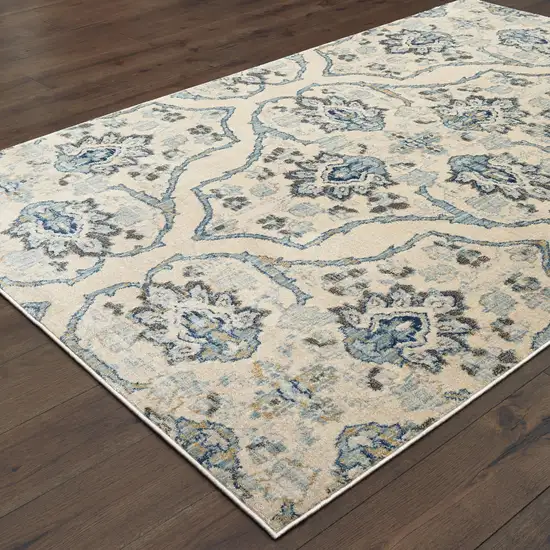 Ivory And Blue Floral Power Loom Stain Resistant Area Rug Photo 4