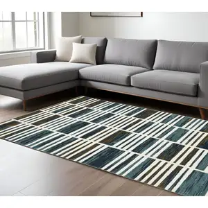 Photo of Ivory And Blue Geometric Area Rug