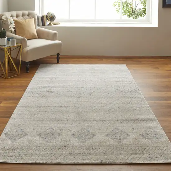 Ivory And Blue Geometric Power Loom Distressed Area Rug Photo 4