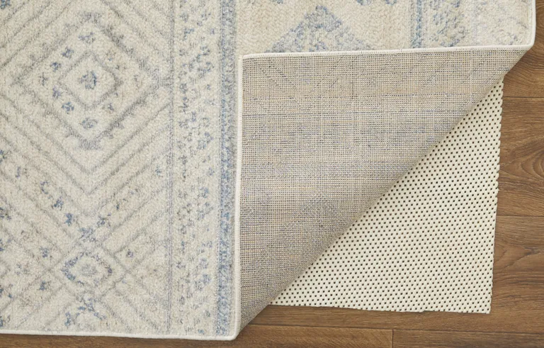 Ivory And Blue Geometric Power Loom Distressed Area Rug Photo 3