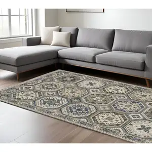 Photo of Ivory And Blue Medallion Area Rug With Fringe