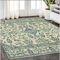 Photo of Ivory And Blue Oriental Area Rug With Fringe