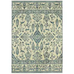 Photo of Ivory And Blue Oriental Area Rug With Fringe