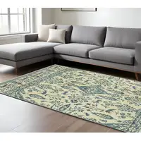 Photo of Ivory And Blue Oriental Area Rug With Fringe