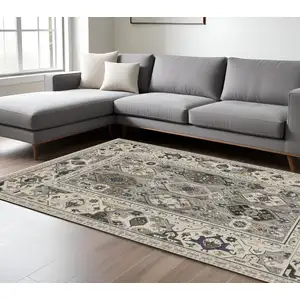 Photo of Ivory And Blue Oriental Area Rug With Fringe