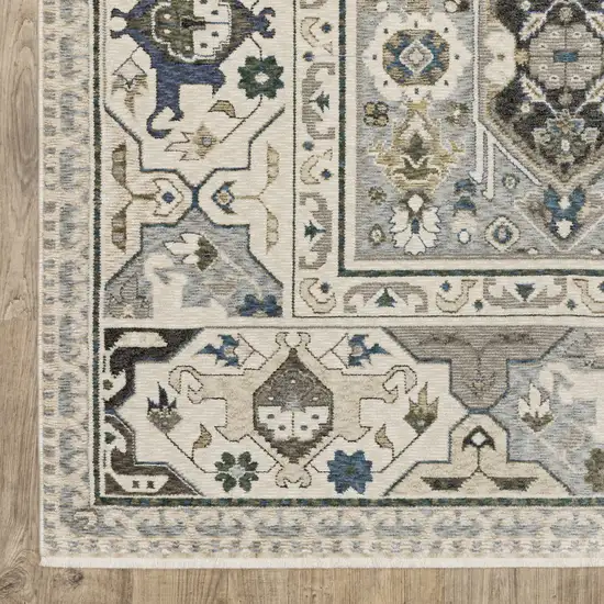 Ivory And Blue Oriental Area Rug With Fringe Photo 9