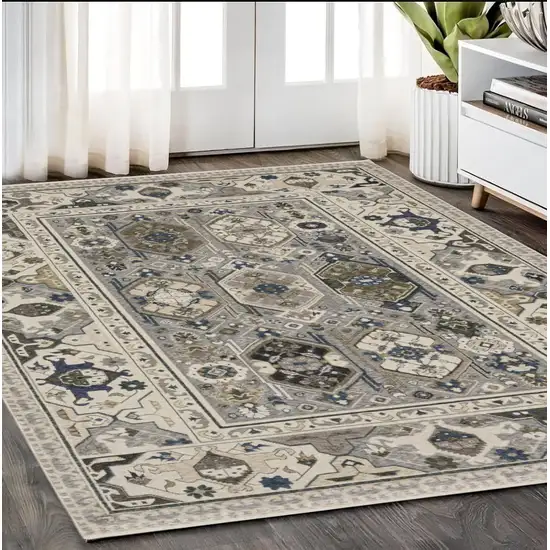 Ivory And Blue Oriental Area Rug With Fringe Photo 1