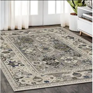 Photo of Ivory And Blue Oriental Area Rug With Fringe