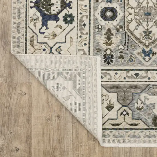 Ivory And Blue Oriental Area Rug With Fringe Photo 9