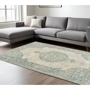 Photo of Ivory And Blue Oriental Distressed Area Rug