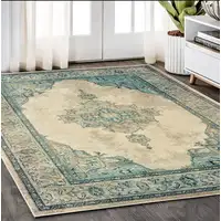 Photo of Ivory And Blue Oriental Distressed Area Rug