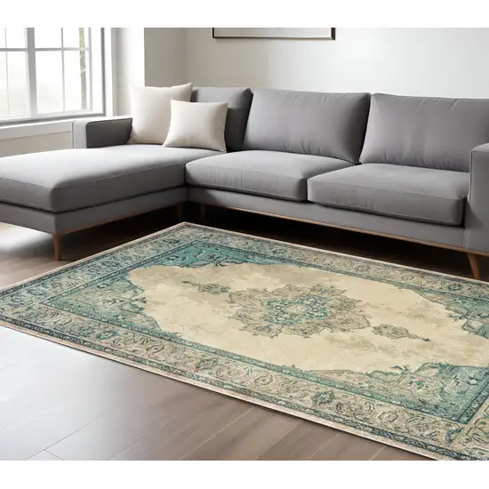 Ivory And Blue Oriental Distressed Area Rug Photo 1