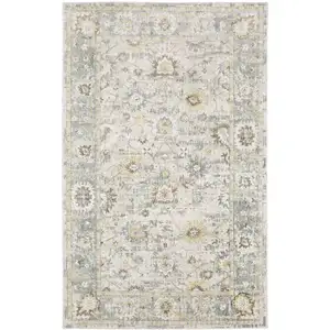 Photo of Ivory And Blue Oriental Hand Tufted Area Rug