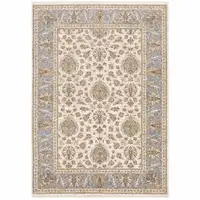 Photo of Ivory And Blue Oriental Power Loom Stain Resistant Area Rug With Fringe