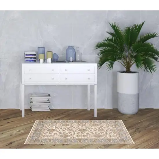 Ivory And Blue Oriental Power Loom Stain Resistant Area Rug With Fringe Photo 2