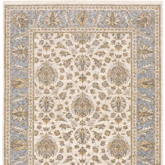 6' X 9' Ivory And Blue Oriental Power Loom Stain Resistant Area Rug With Fringe Photo 6