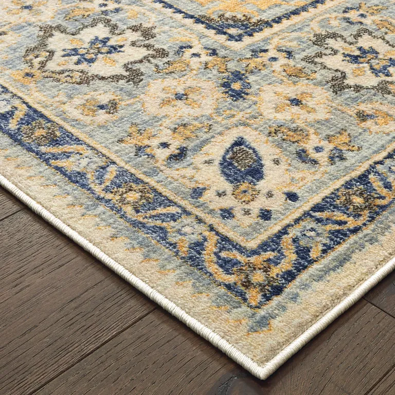 Ivory And Blue Oriental Power Loom Stain Resistant Area Rug Photo 3