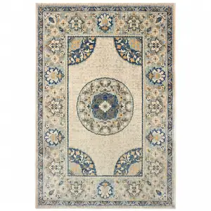 Photo of Ivory And Blue Oriental Power Loom Stain Resistant Area Rug