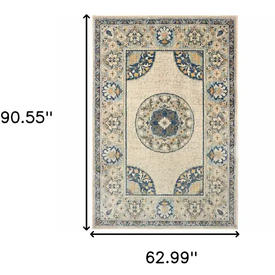 Ivory And Blue Oriental Power Loom Stain Resistant Area Rug Photo 5