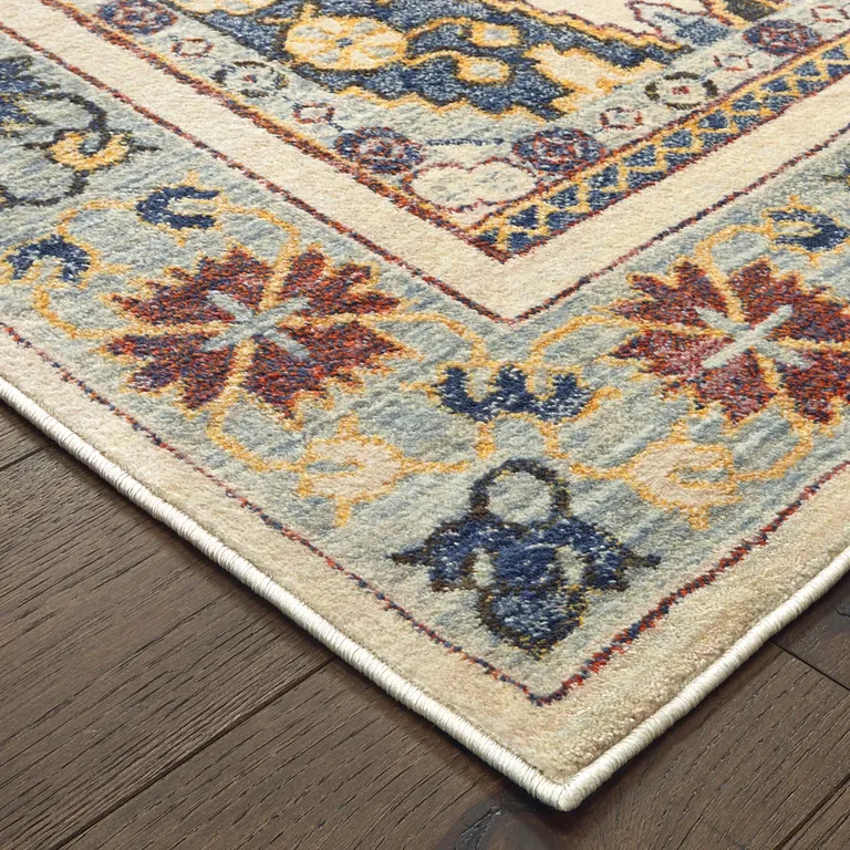 Ivory And Blue Oriental Power Loom Stain Resistant Area Rug Photo 3