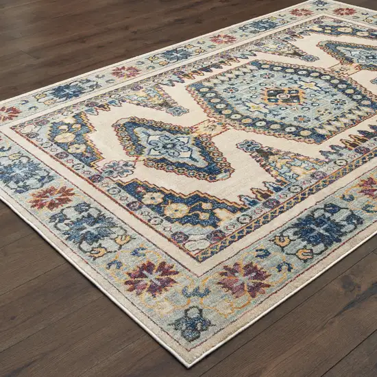 Ivory And Blue Oriental Power Loom Stain Resistant Area Rug Photo 4