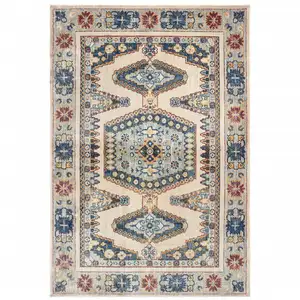 Photo of Ivory And Blue Oriental Power Loom Stain Resistant Area Rug