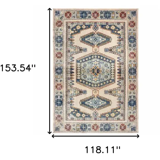 Ivory And Blue Oriental Power Loom Stain Resistant Area Rug Photo 5