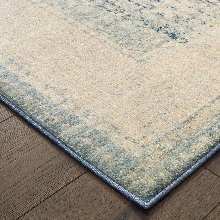 Ivory And Blue Oriental Power Loom Stain Resistant Area Rug Photo 3