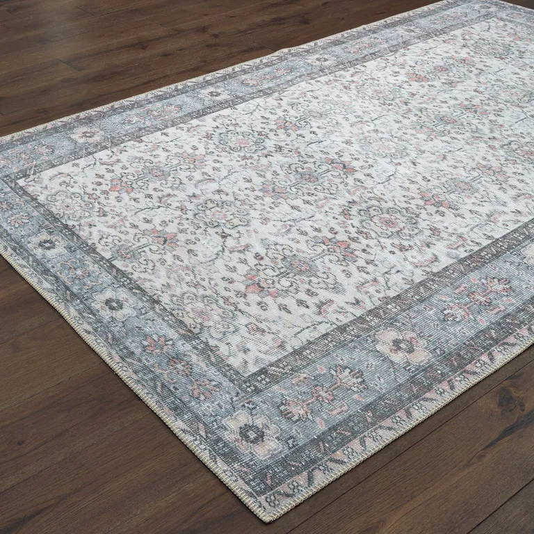 Ivory And Blue Oriental Power Loom Stain Resistant Area Rug Photo 4