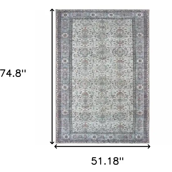 Ivory And Blue Oriental Power Loom Stain Resistant Area Rug Photo 5