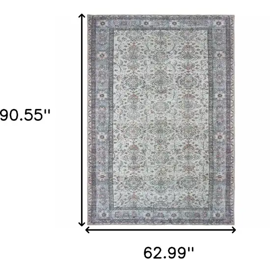 Ivory And Blue Oriental Power Loom Stain Resistant Area Rug Photo 5