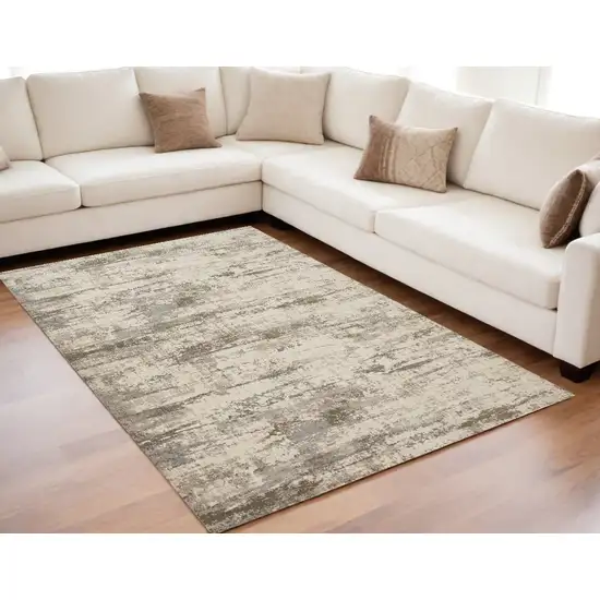 Ivory And Brown Abstract Area Rug Photo 1