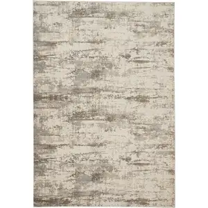 Photo of Ivory And Brown Abstract Area Rug