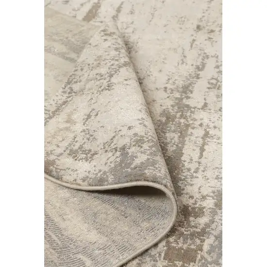 Ivory And Brown Abstract Area Rug Photo 9