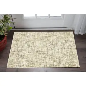 Photo of Ivory And Brown Abstract Area Rug