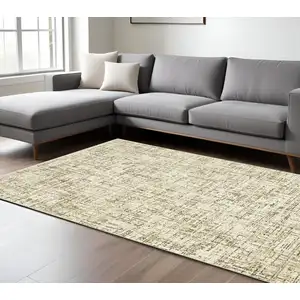 Photo of Ivory And Brown Abstract Area Rug