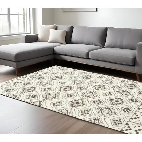 Ivory And Brown Geometric Shag Power Loom Stain Resistant Area Rug Photo 1