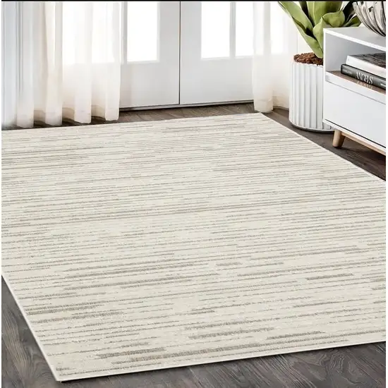 Ivory And Brown Striped Distressed Area Rug Photo 1