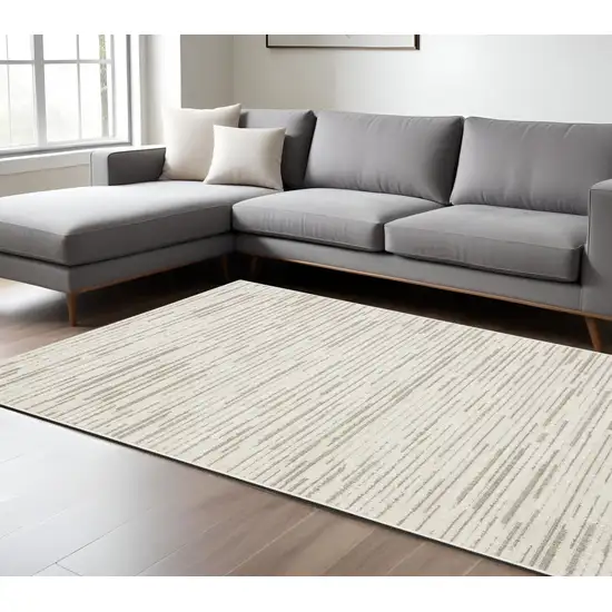 Ivory And Brown Striped Distressed Area Rug Photo 1