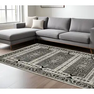 Photo of Ivory And Charcoal Oriental Area Rug With Fringe