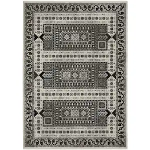 Photo of Ivory And Charcoal Oriental Area Rug With Fringe