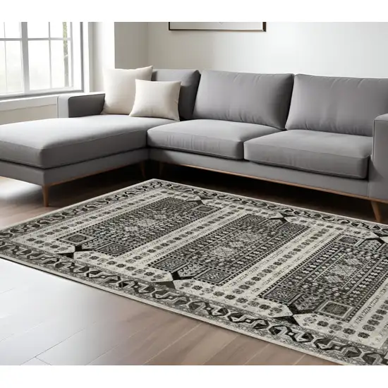 Ivory And Charcoal Oriental Area Rug With Fringe Photo 1