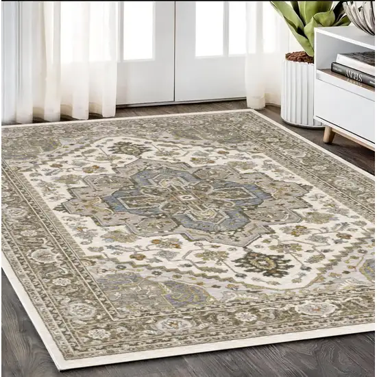 Ivory And Gold Medallion Distressed Area Rug With Fringe Photo 1