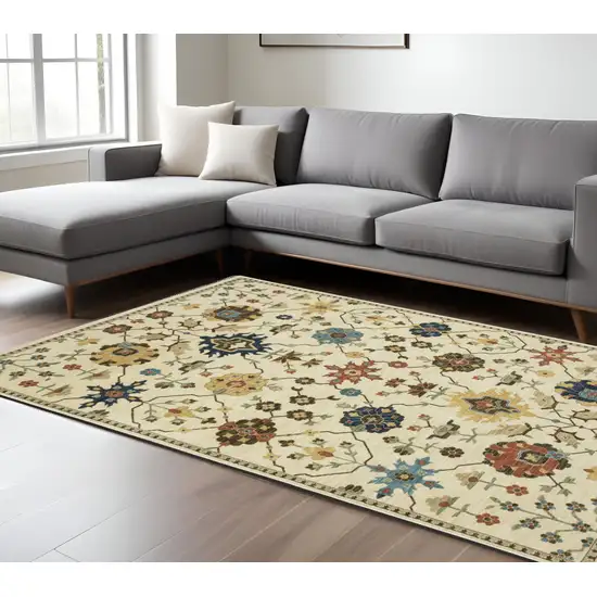 Ivory And Gold Oriental Area Rug With Fringe Photo 1