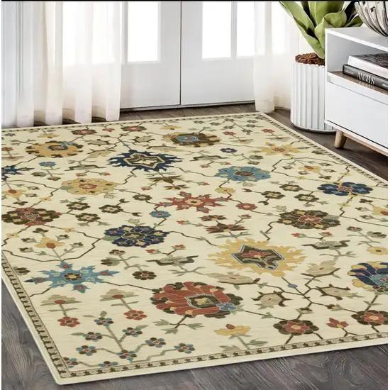 Ivory And Gold Oriental Area Rug With Fringe Photo 1