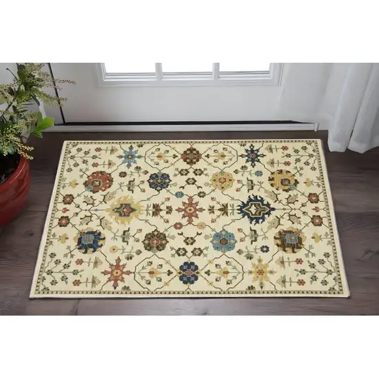 Ivory And Gold Oriental Area Rug With Fringe Photo 1